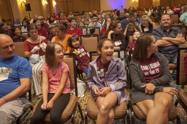 This photo is of the comedy show at the 2018 debra Care Conference (DCC).