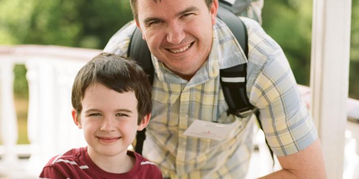 This photo is of a father and son.